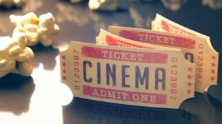 Entry ticket to the cinema with popcorn around.